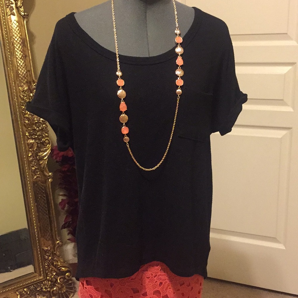 Soft black knit top short cuff sleeve low in back